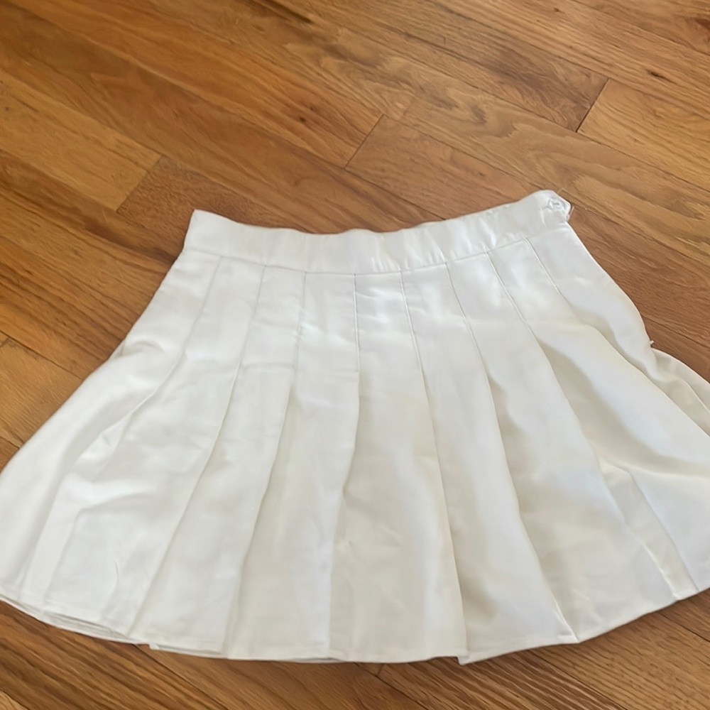 White pleated skirt